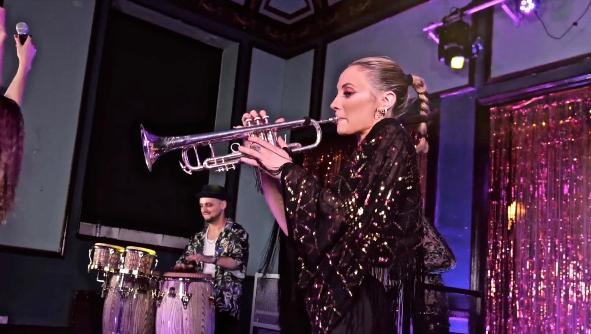 Live trumpet and percussion performing live